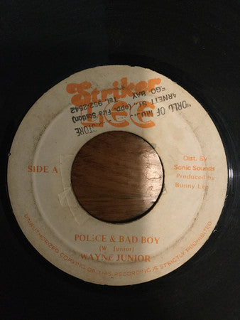 Wayne Junior – Police And Bad Boy (7", Jamaica - 1986)