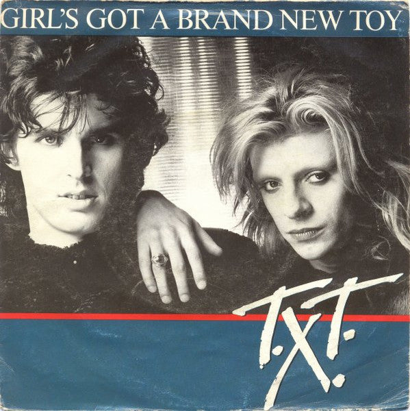 T.X.T. – Girl's Got A Brand New Toy (7", Italy - 1985)