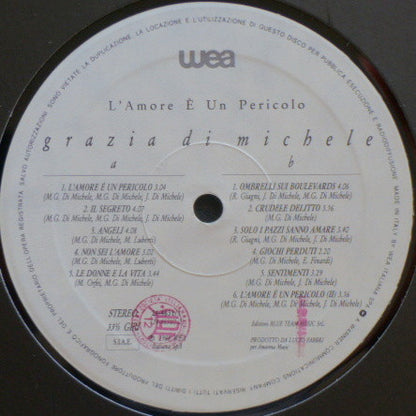 Grazia Di Michele – L'Amore È Un Pericolo (LP, Album, Italy - 1988)