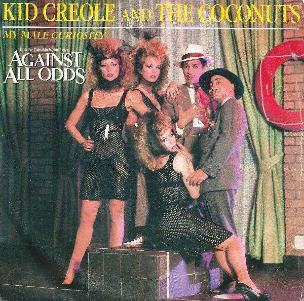 Kid Creole And The Coconuts – My Male Curiosity (7", Italy - 1984)
