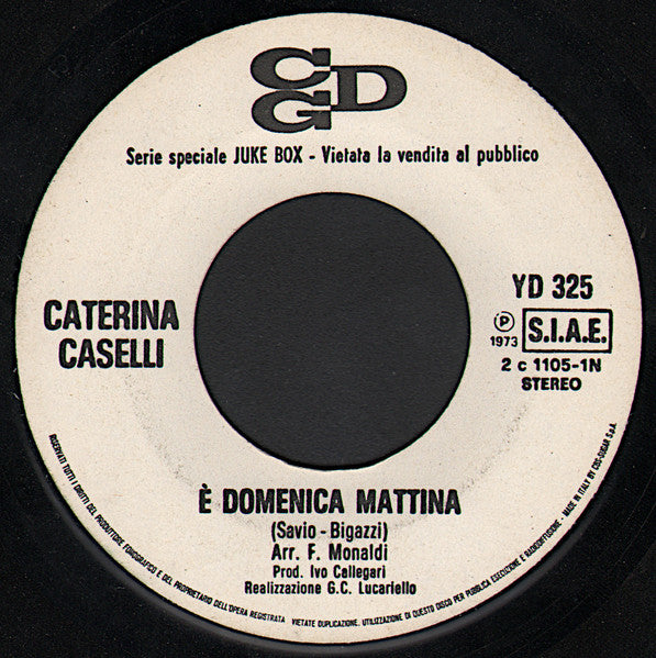 Caterina Caselli, Marcella Bella – È Domenica Mattina / Un Sorriso E Poi Perdonami (7", Italy - 1973)