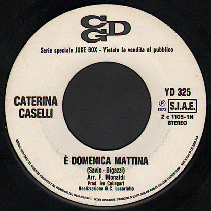 Caterina Caselli, Marcella Bella – È Domenica Mattina / Un Sorriso E Poi Perdonami (7", Italy - 1973)