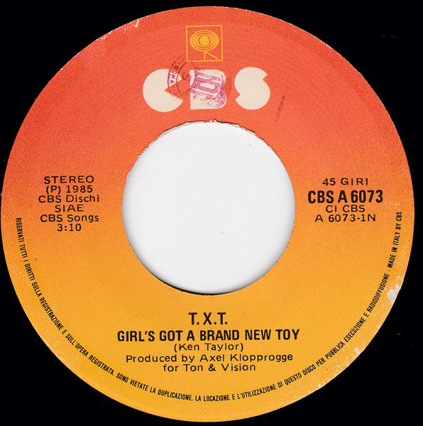 T.X.T. – Girl's Got A Brand New Toy (7", Italy - 1985)